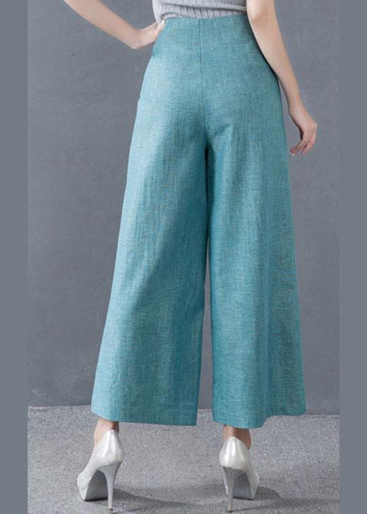 Blaue High-Waist-Hose mit weitem Bein und Knopfdetail für den Herbst