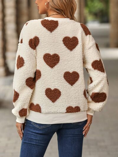 Gemütlicher Strickpullover mit Herzmuster für herbstliche Lagenlooks