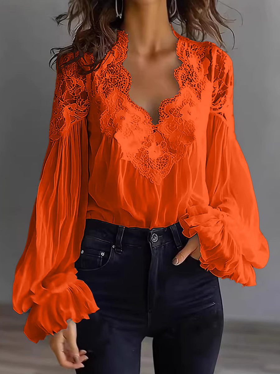 Damenbluse mit Spitzenpatchwork und Puffärmeln