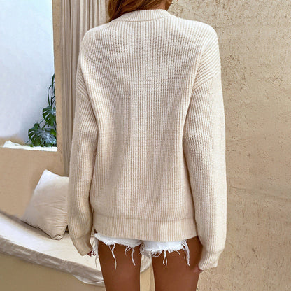 Gemütlicher Strickpullover mit stylischem Knopfkragen