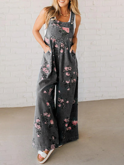 Jeans-Latzhose mit weitem Bein und Blumenmuster