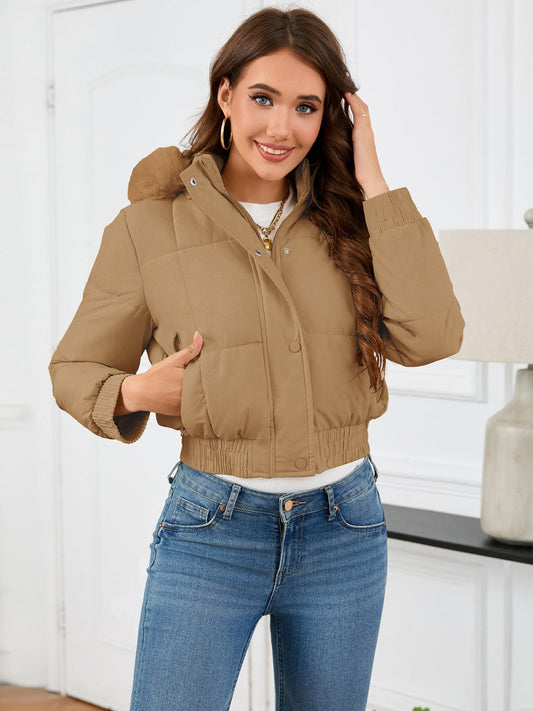Gemütliche wattierte Winterjacke mit Fellkapuze und Taschen