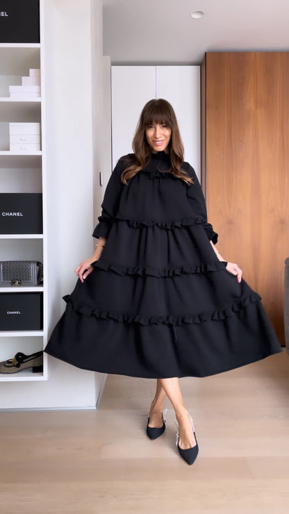 Elegantes klassisches schwarzes ärmelloses Kleid