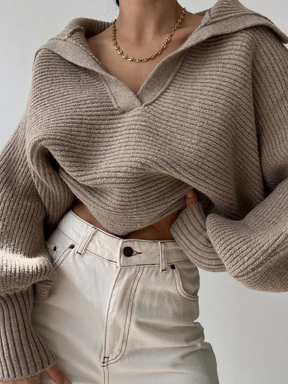 Gemütlicher Strickpullover mit Laternenärmeln und offenem Kragen