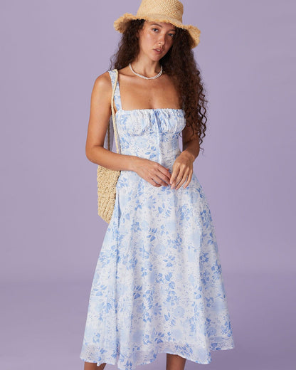 Blaues Midikleid mit Blumendruck, Raffung und quadratischem Ausschnitt