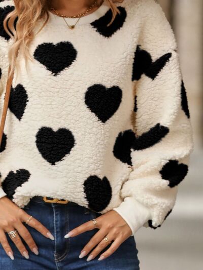 Gemütlicher Strickpullover mit Herzmuster für herbstliche Lagenlooks