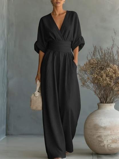 Eleganter Overall mit V-Ausschnitt, hoher Taille und weitem Bein