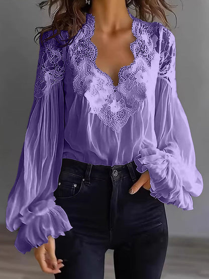 Damenbluse mit Spitzenpatchwork und Puffärmeln